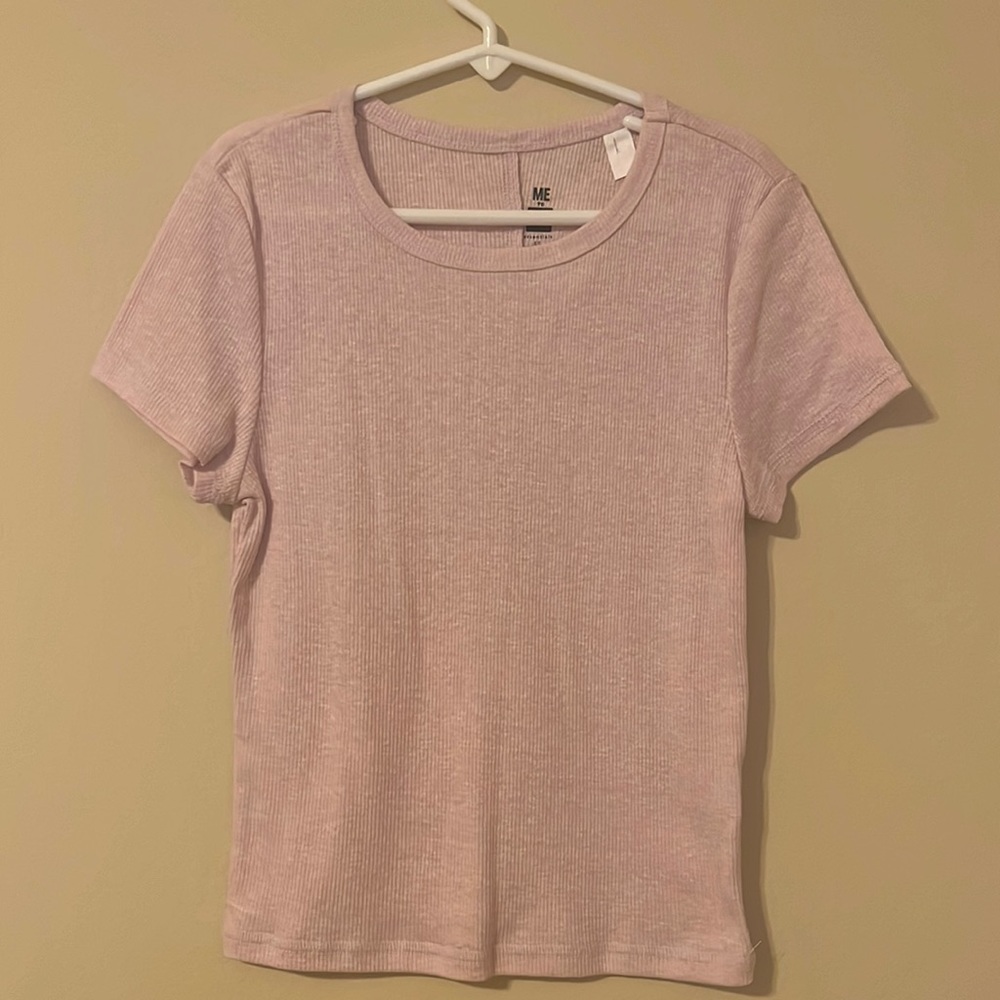 Girl’s fitted tee with cute stitching.